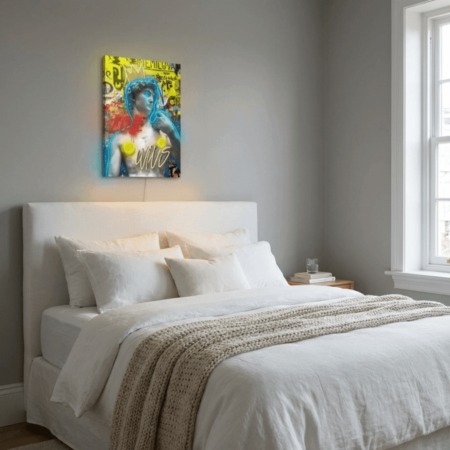 A modern bedroom features a neatly made bed with neutral bedding and the Neon Sign "Love Wins" hanging above the headboard, adding a pop of color. Natural light streams in through the window.